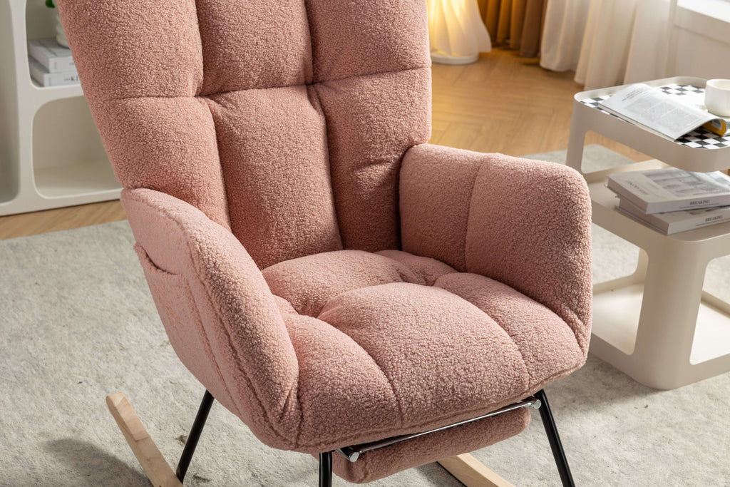 pink teddy rocking chair with footstool in a cozy living room setting, featuring soft fabric and ergonomic design.