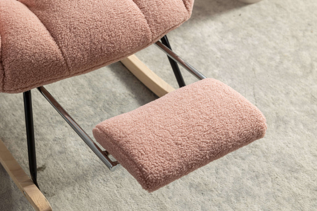 Close-up of the pink teddy rocking chair with footstool showcasing its cozy texture and ergonomic design.